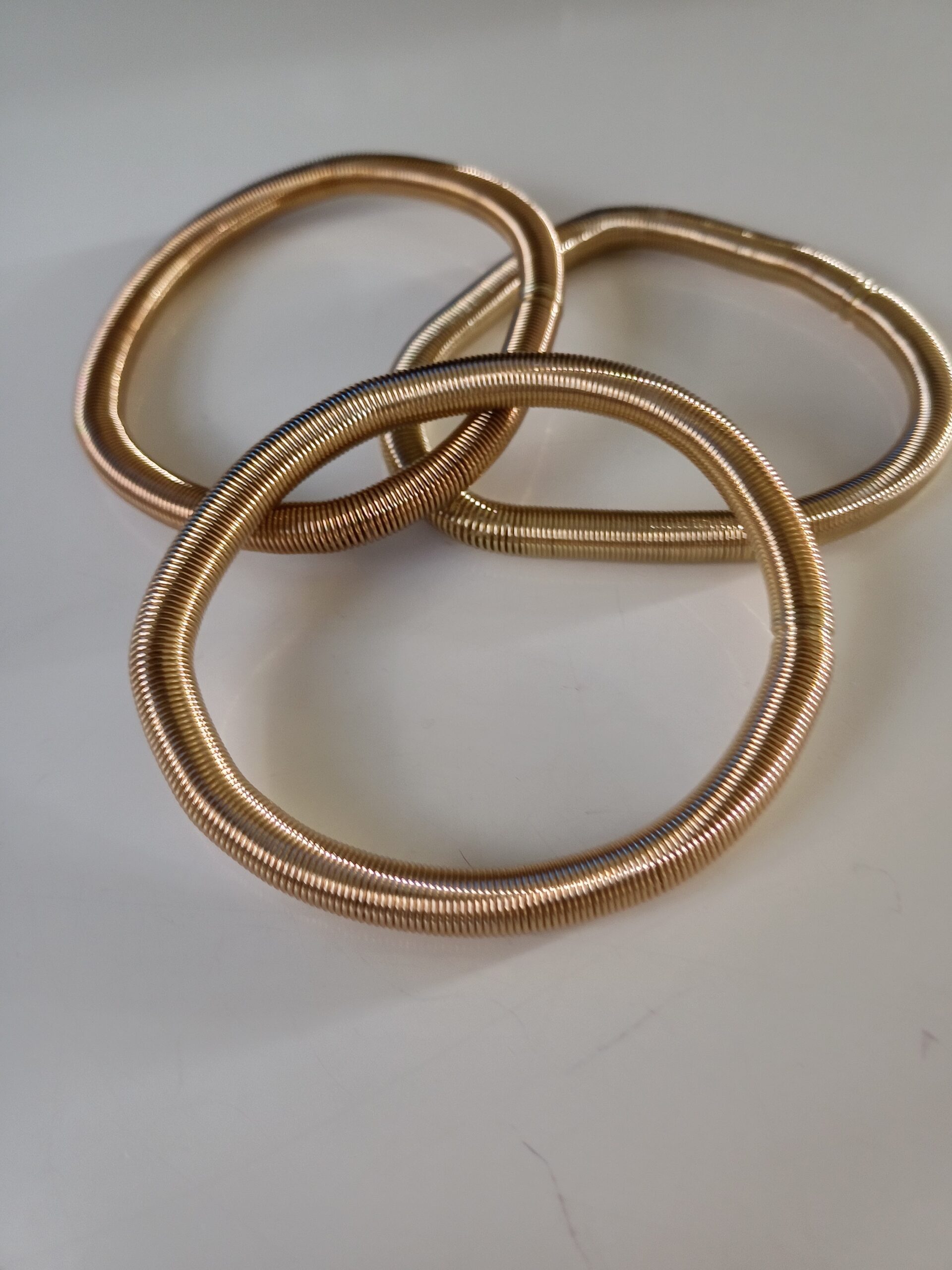 3 Skinny Gold Spring Bracelets